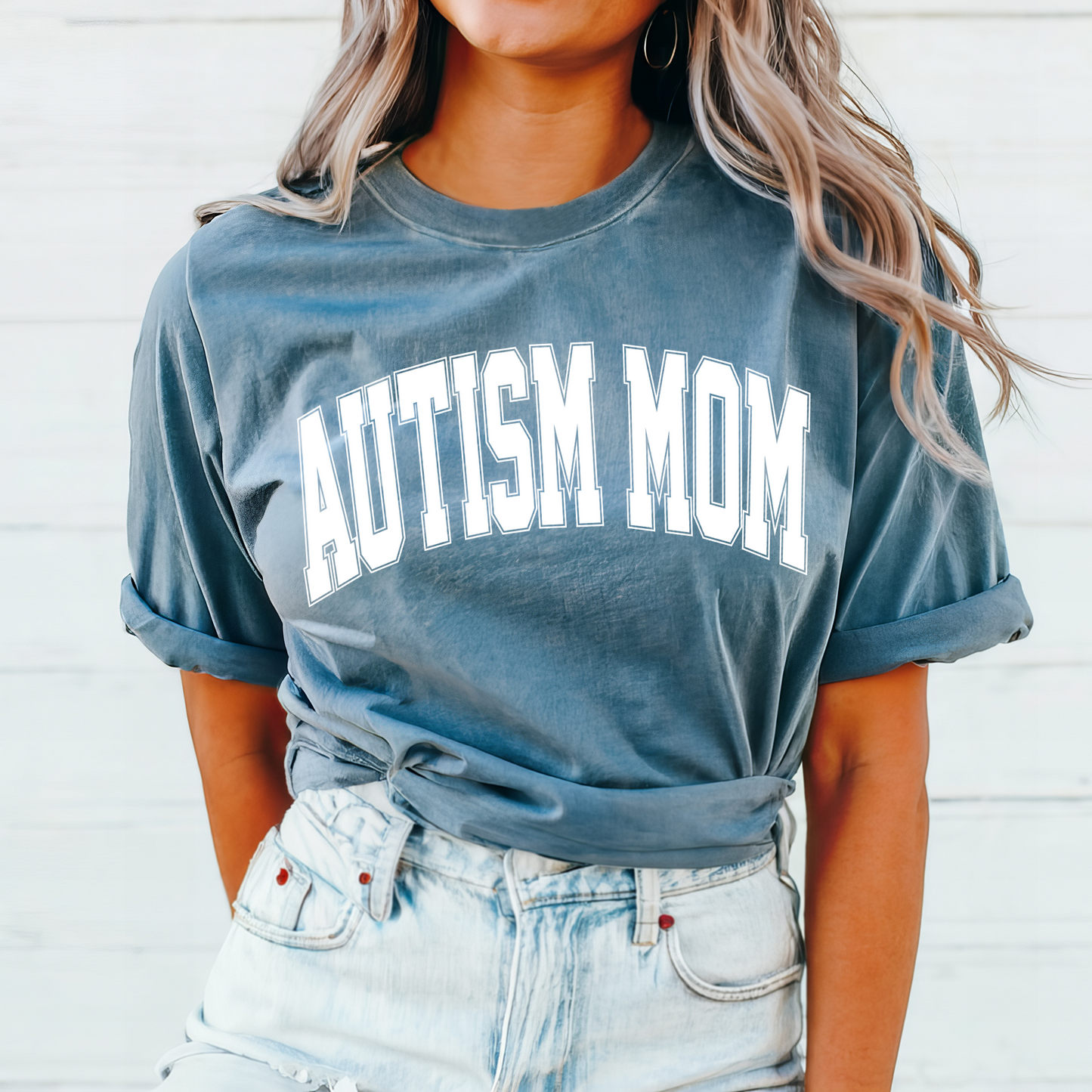 Handmade Autism Mom Varsity Letter T-Shirt with bold lettering, celebrating autism moms and advocacy. Soft, sensory-friendly, and supporting autism awareness with every purchase.
